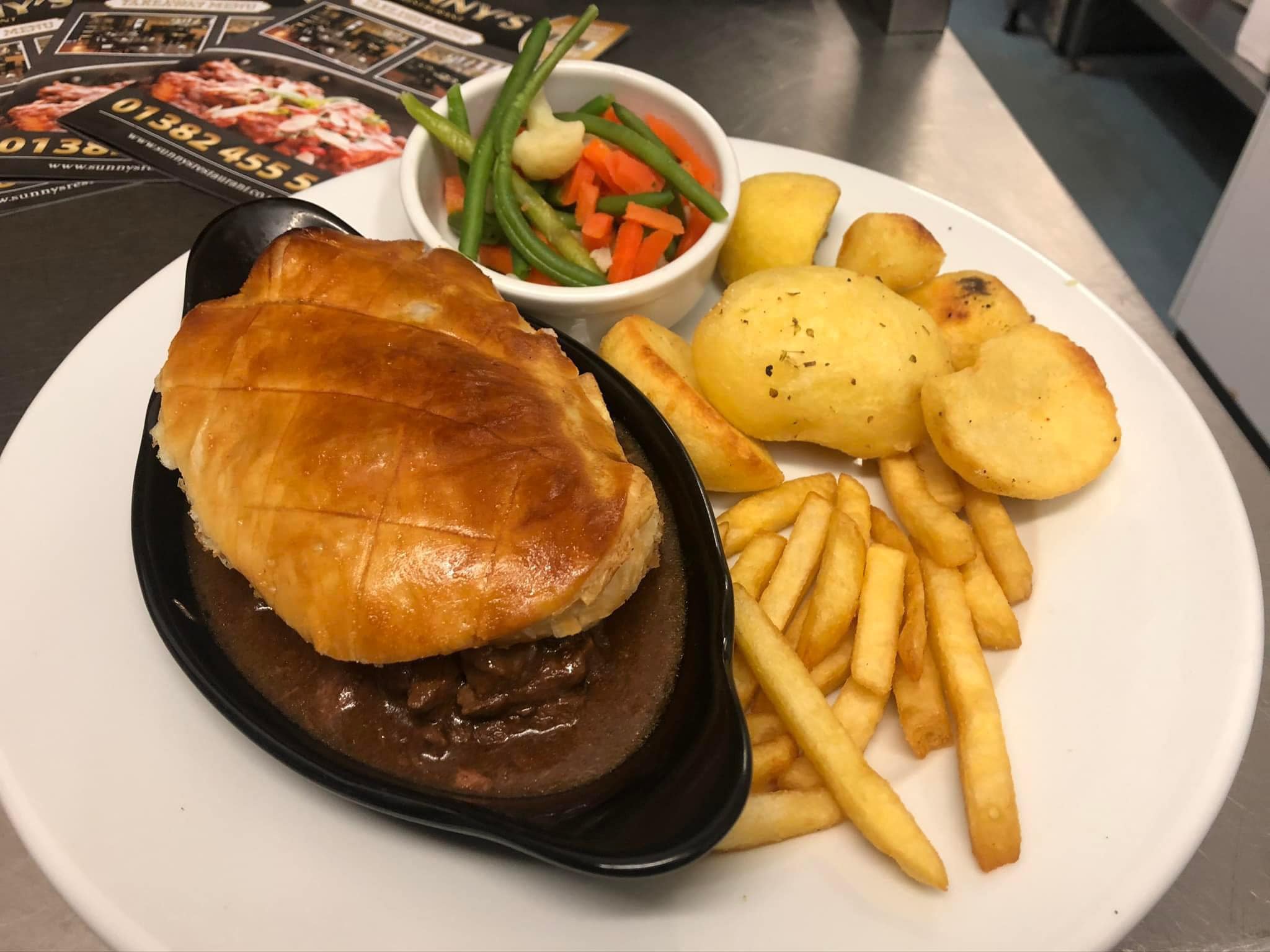 Steak Pie Meal with Bread, Fries and Vegetables Served at Wee Sunny’s in Dundee